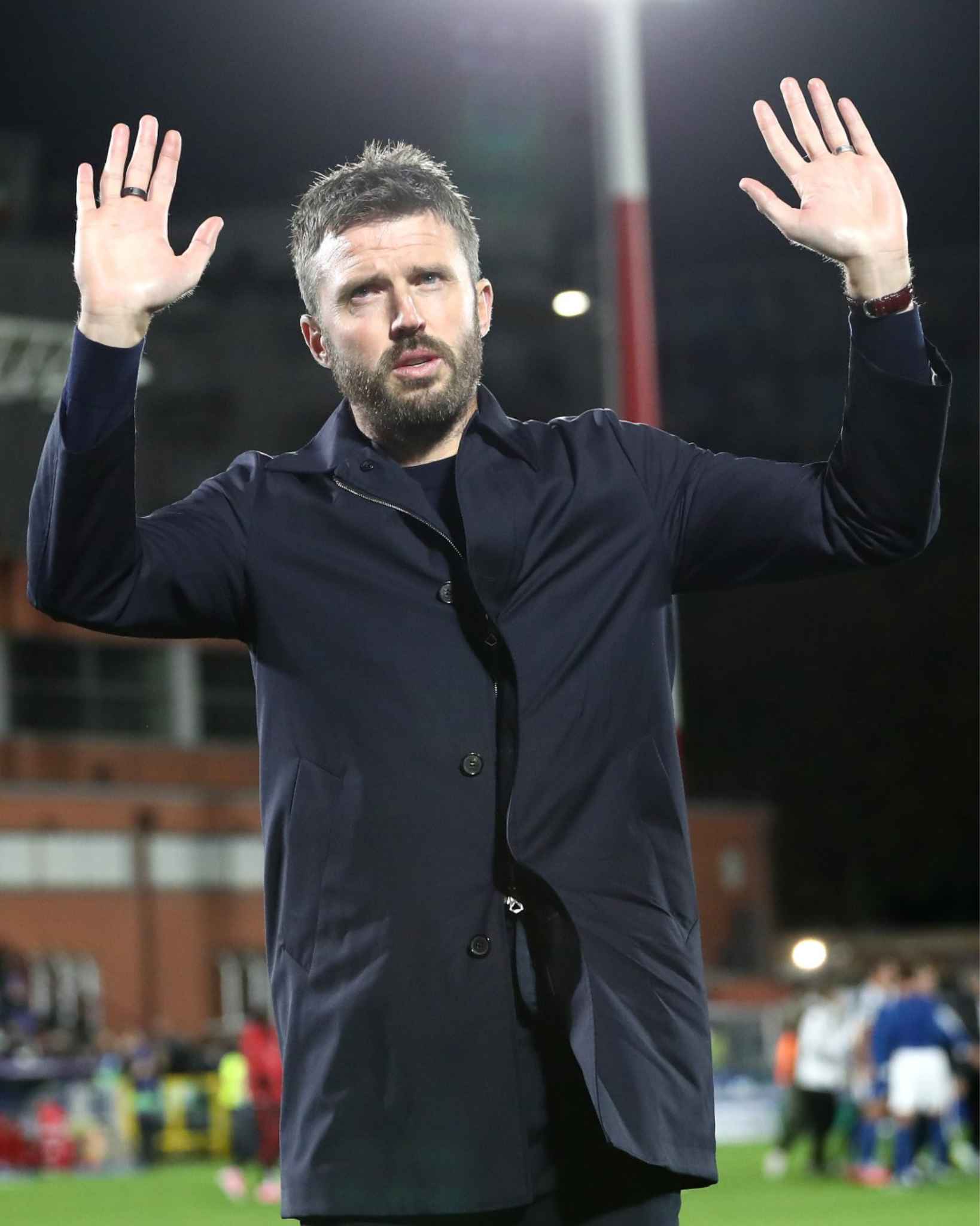 Michael Carrick acknowledges the Manchester United supporters after the heavy defeat to Como.