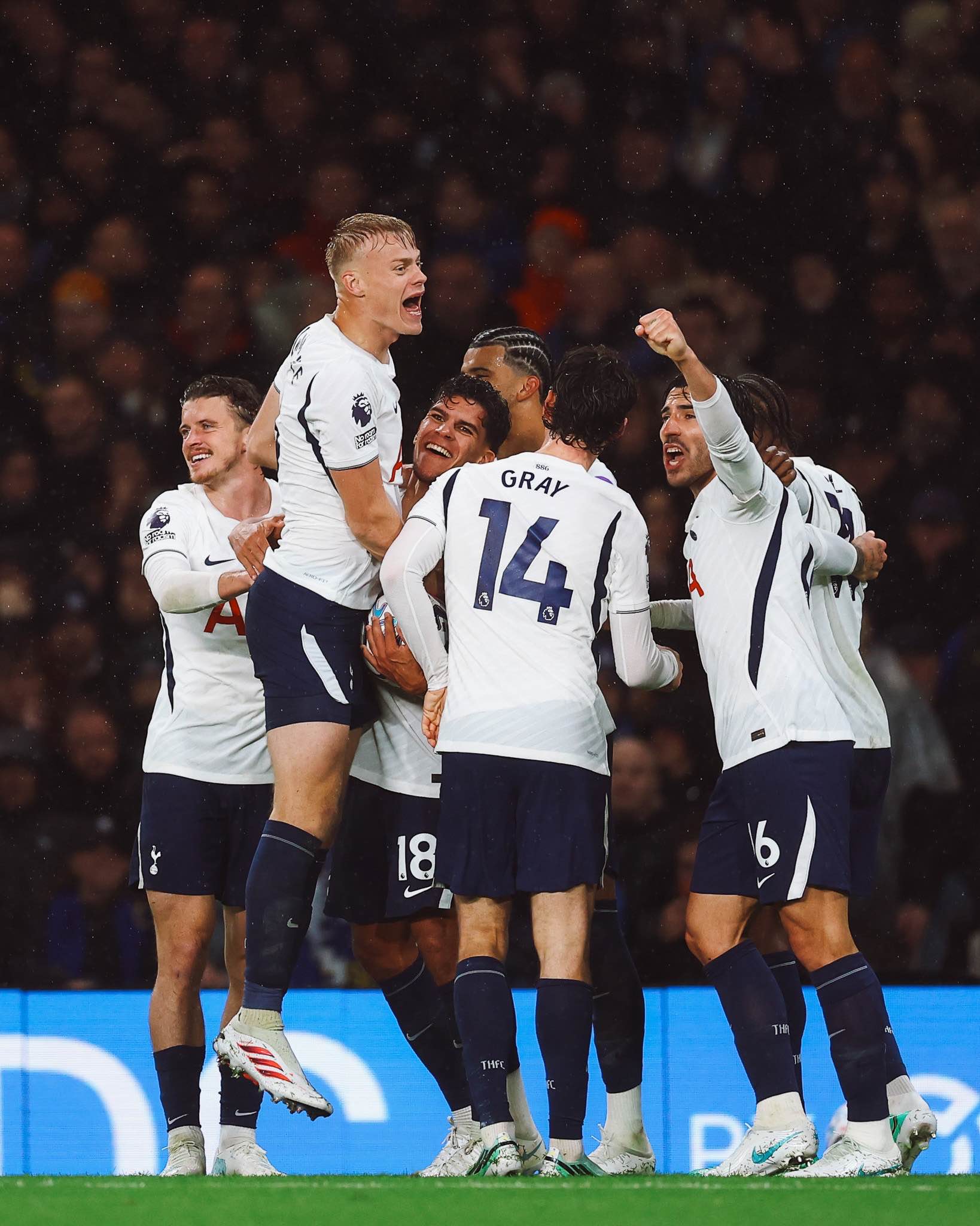 Spurs celebrate after securing a 2-0 win at Stamford Bridge.