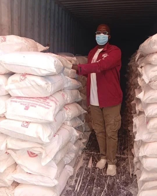 NDLEA personnel inspect seized drugs.