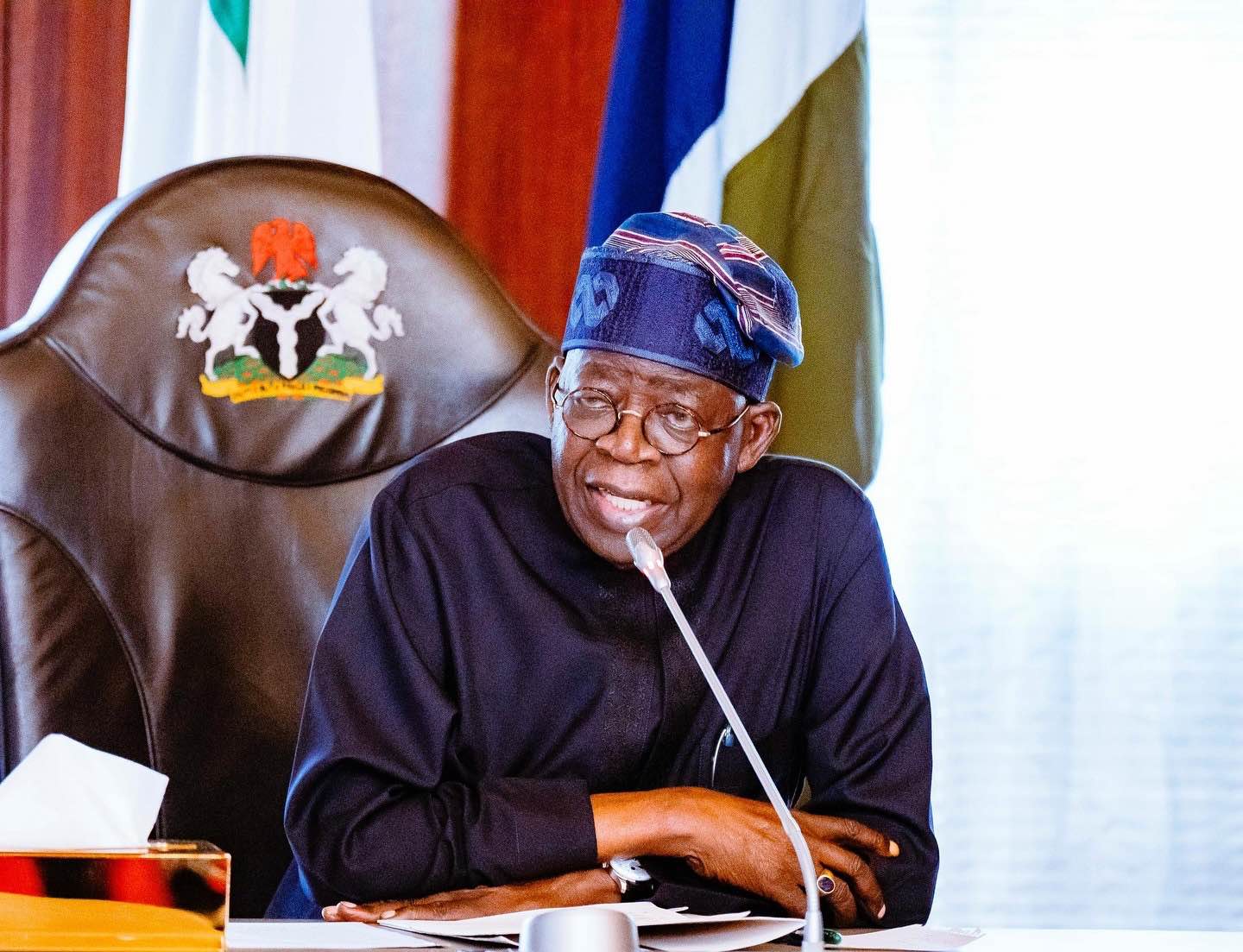 President Bola Tinubu speaks during a government meeting.