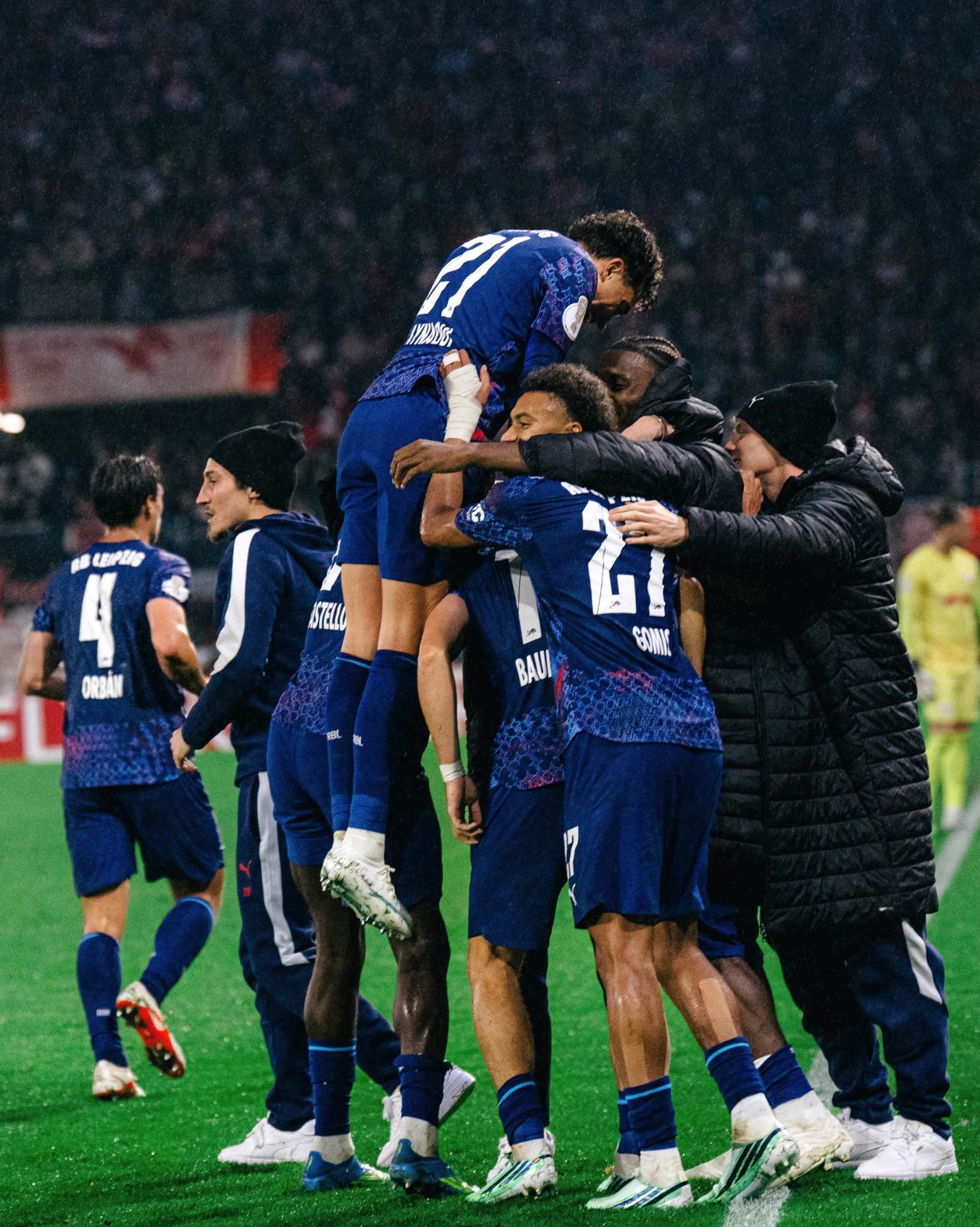 RB Leipzig players celebrate after completing a 2-1 comeback victory.