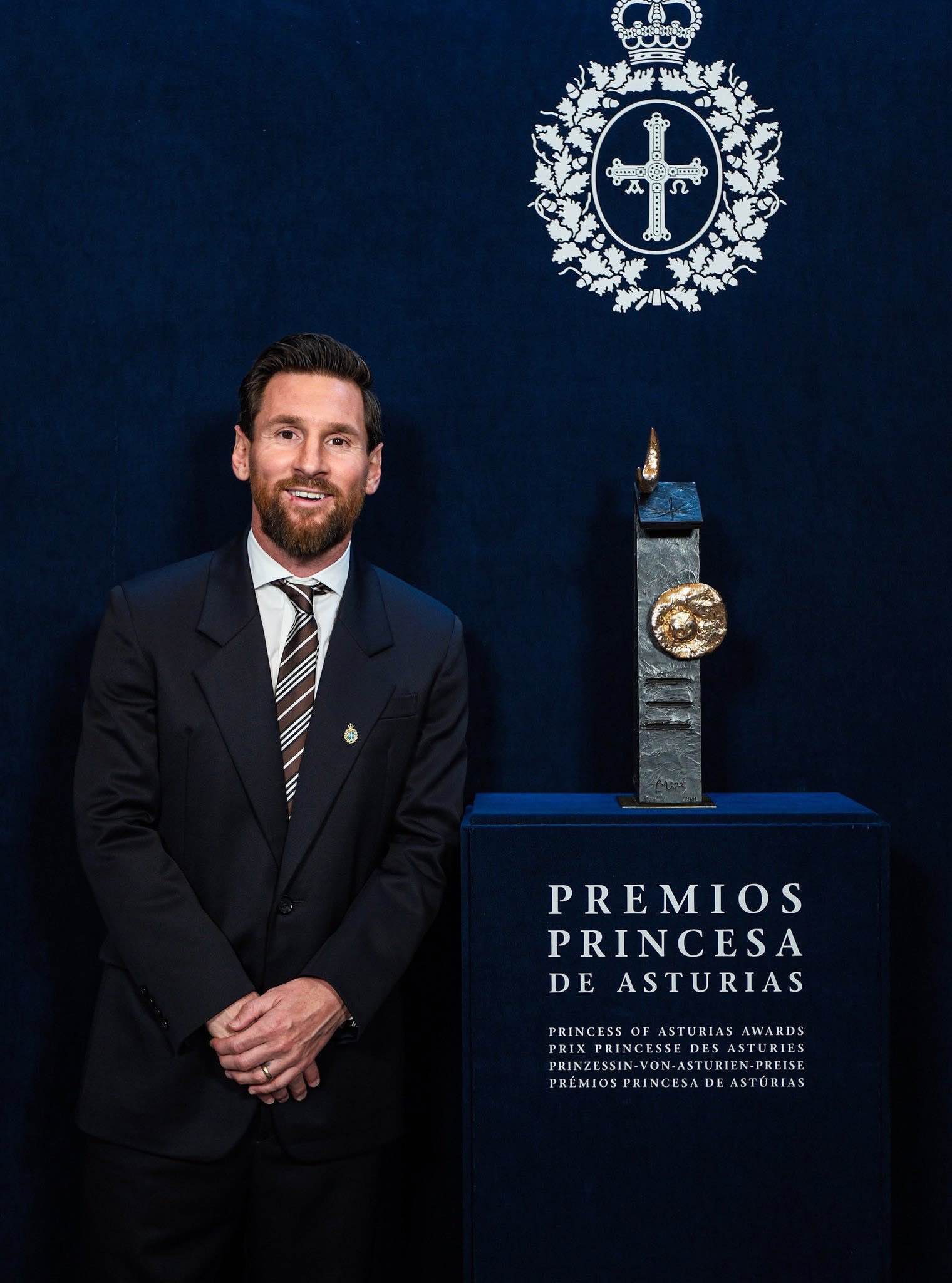 Messi poses proudly with the prestigious sports award in Spain.