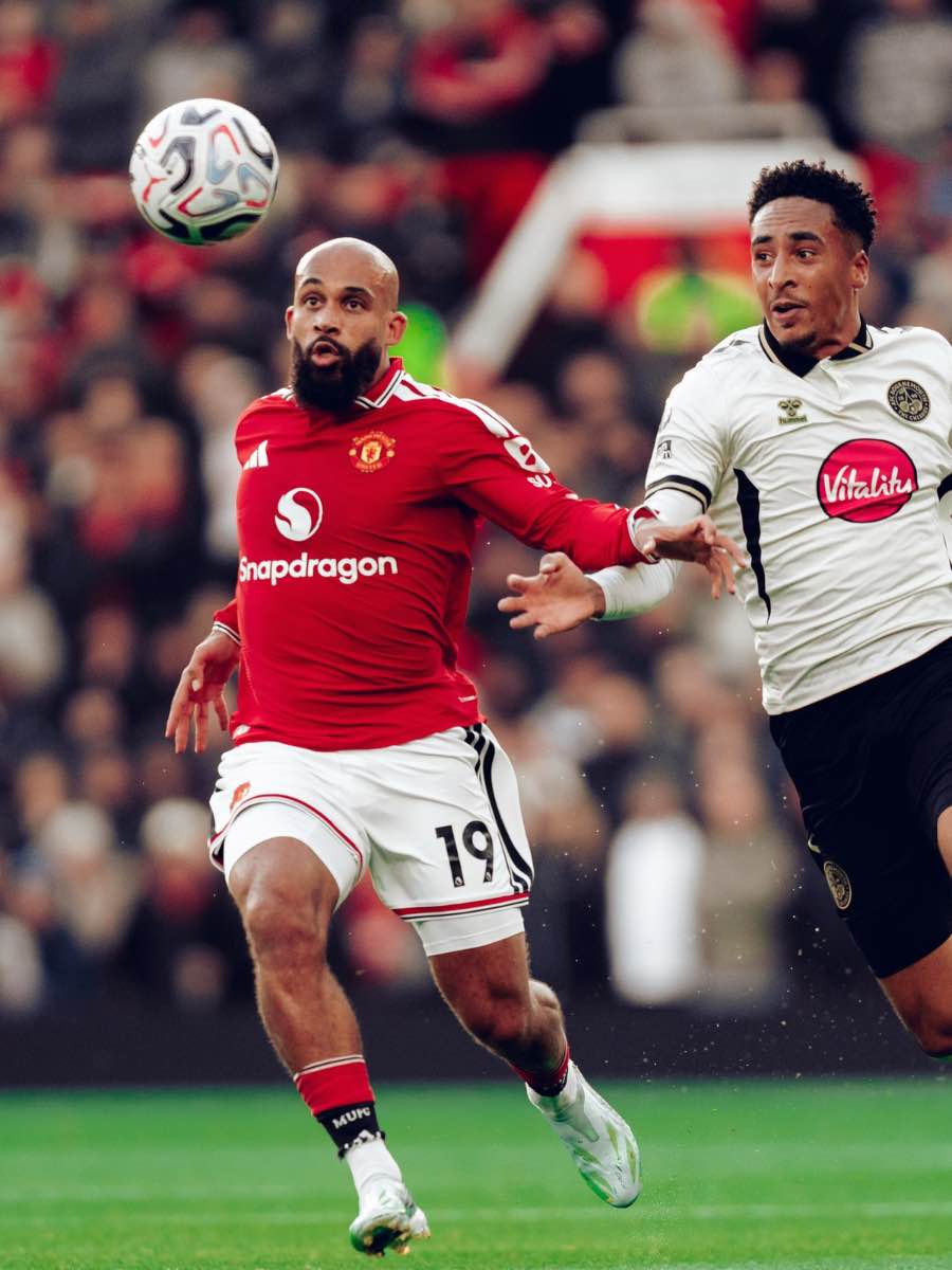 Manchester United’s players compete for the ball against Bournemouth.