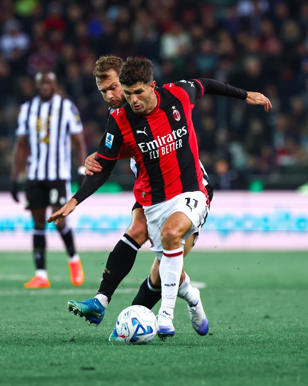 Christian Pulisic fights for the ball during AC Milan’s victory over Udinese.