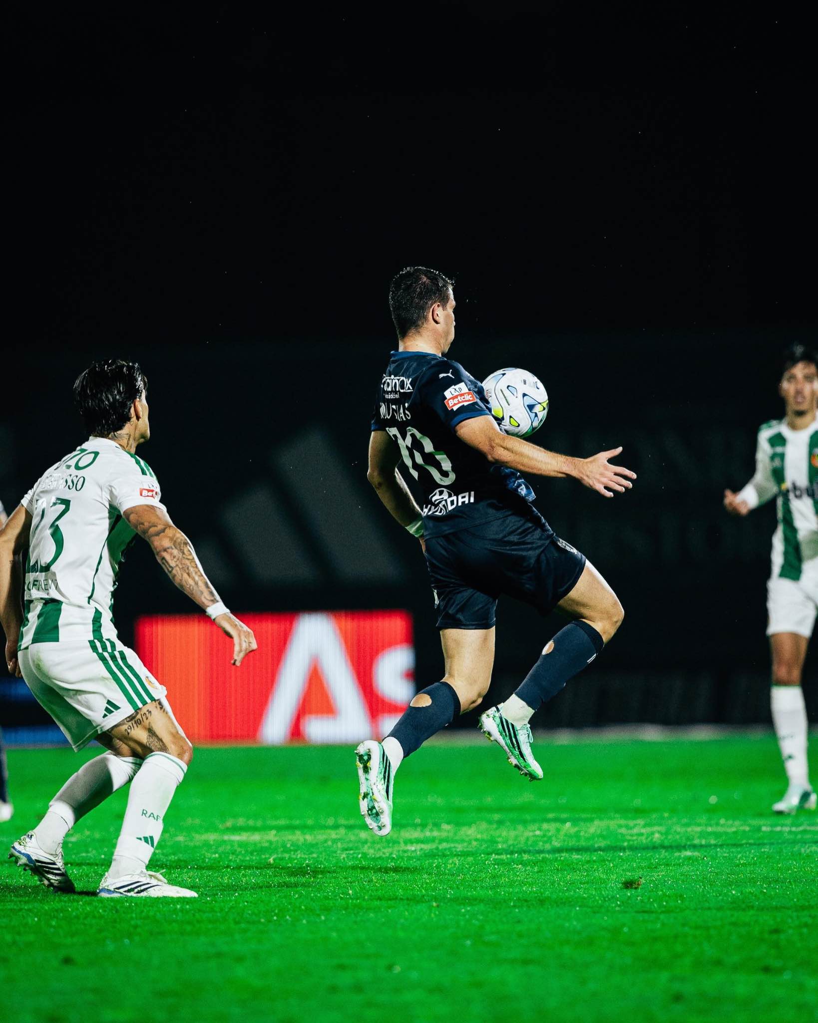 Famalicão’s players compete for the ball against Rio Ave.