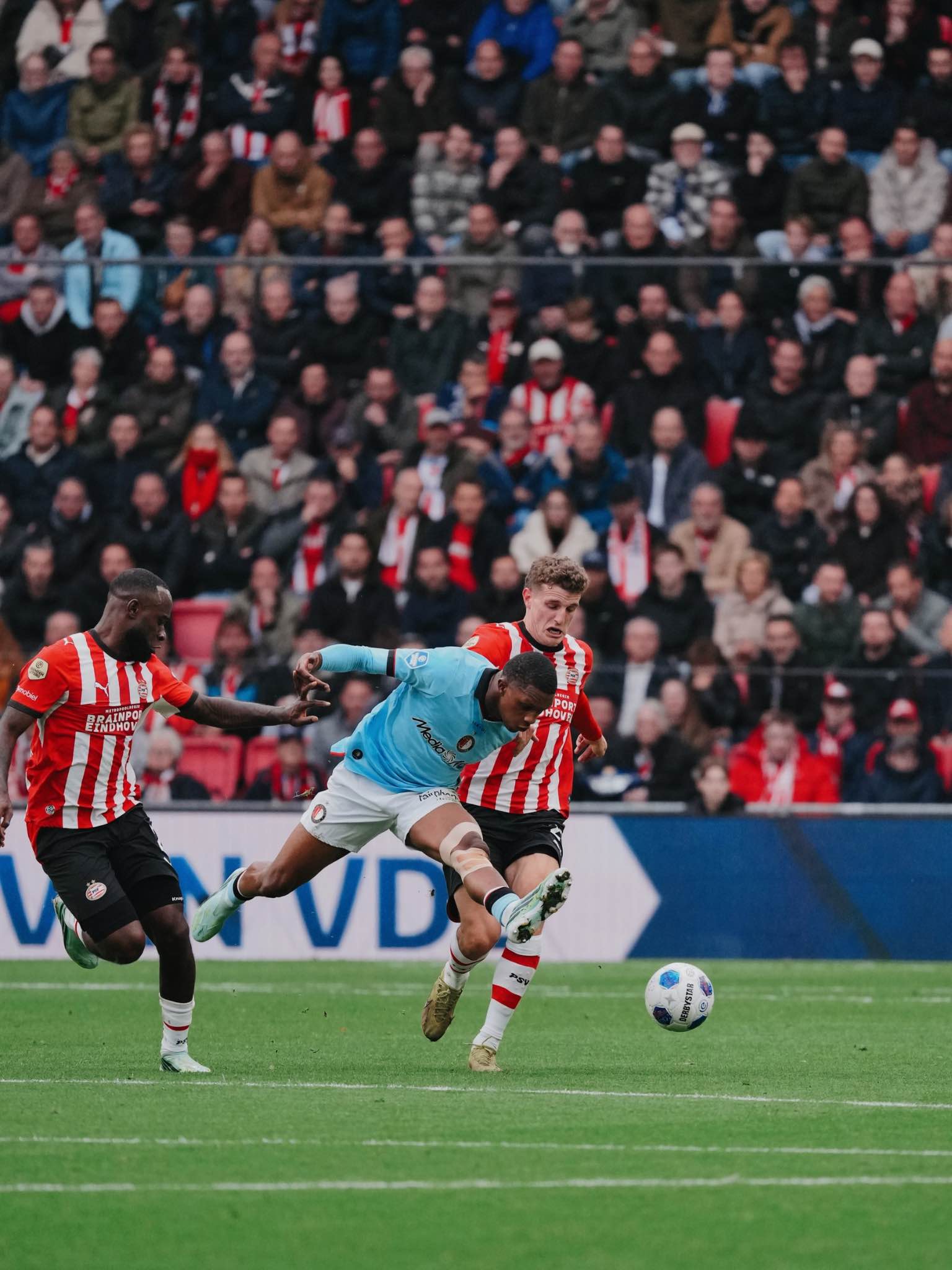 A tense moment from the Eredivisie clash in Eindhoven.